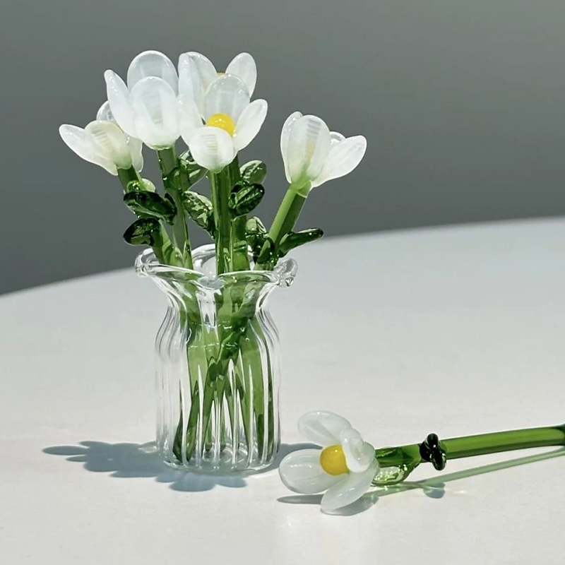 Blomsterpynt i glass