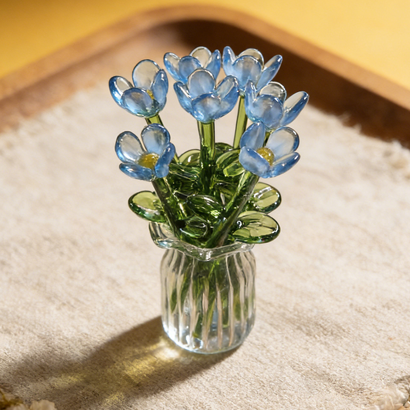 Blomsterpynt i glass