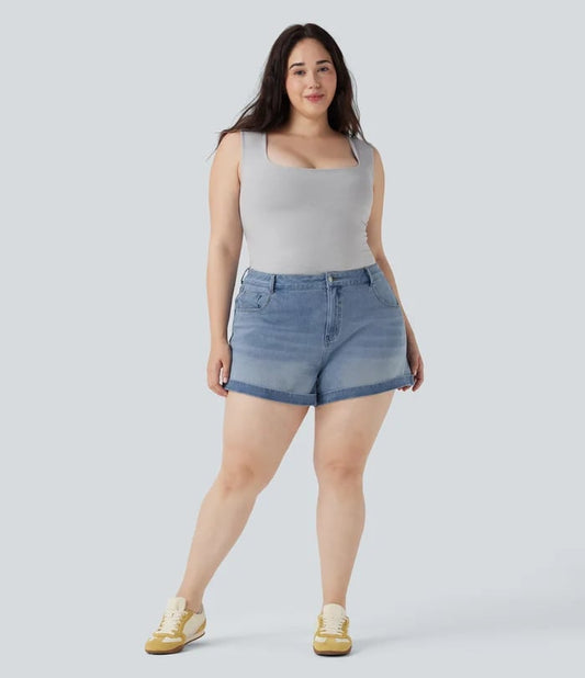 Mellomhøy midje med knapper og glidelås, flere lommer, elastisk strikket denimshorts med avslappet passfor