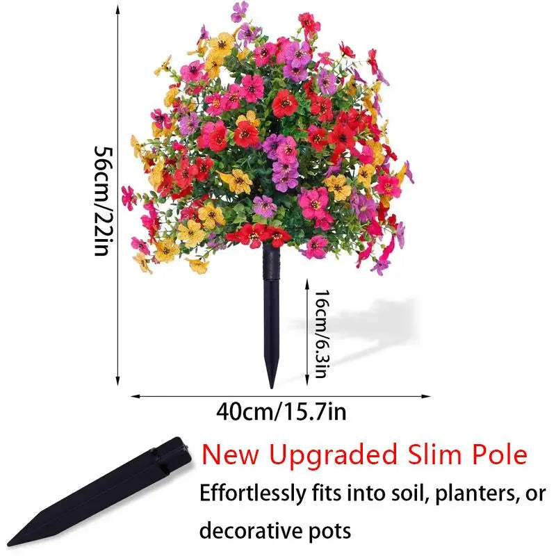 Blomsterdekorasjon med kunstig eukalyptus og fiol i bakken