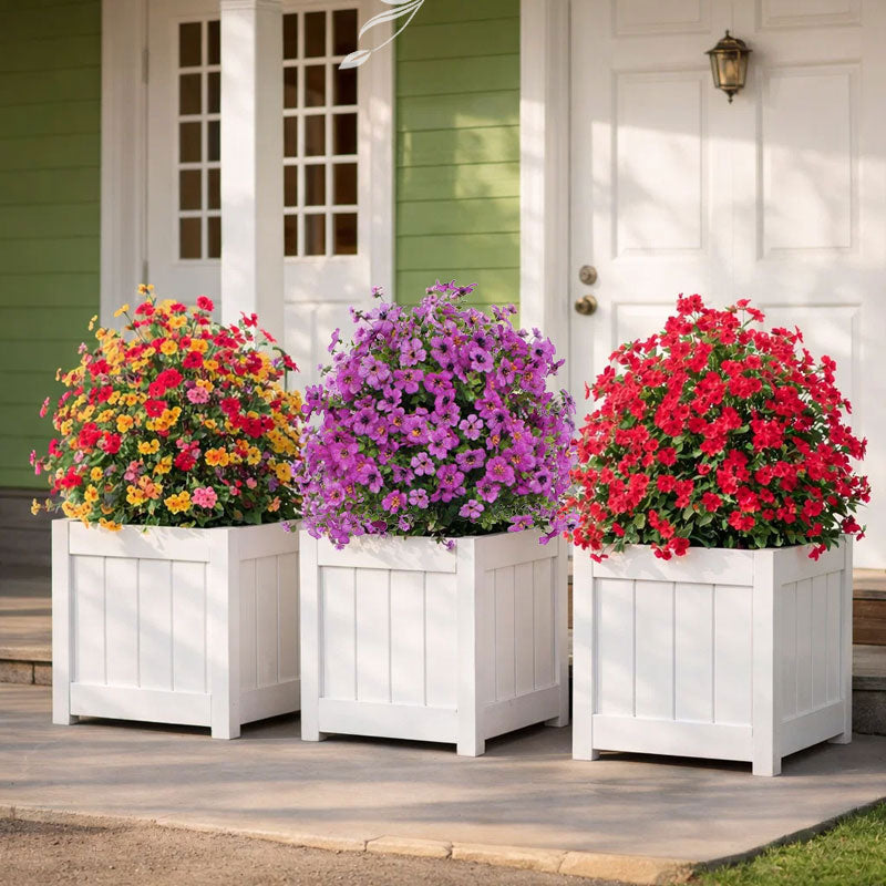 Blomsterdekorasjon med kunstig eukalyptus og fiol i bakken