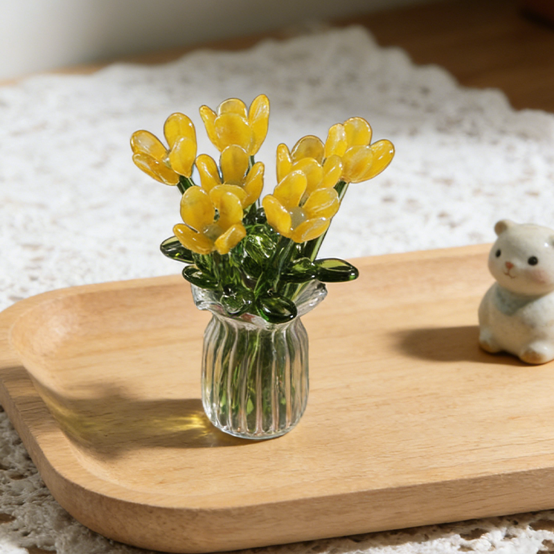 Blomsterpynt i glass