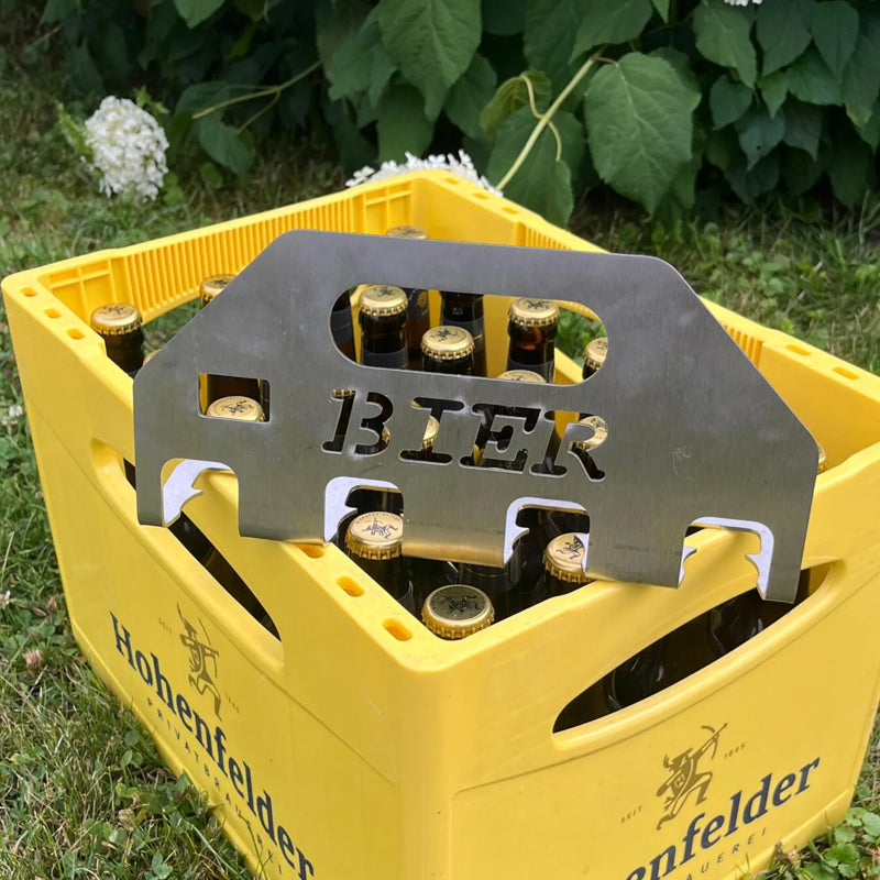 Quad-ølåpneren og -bæreren