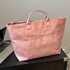 Toteveske med bokstavtrykk for kvinner