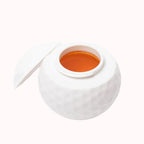 Kreativt shotglass formet som en golfball