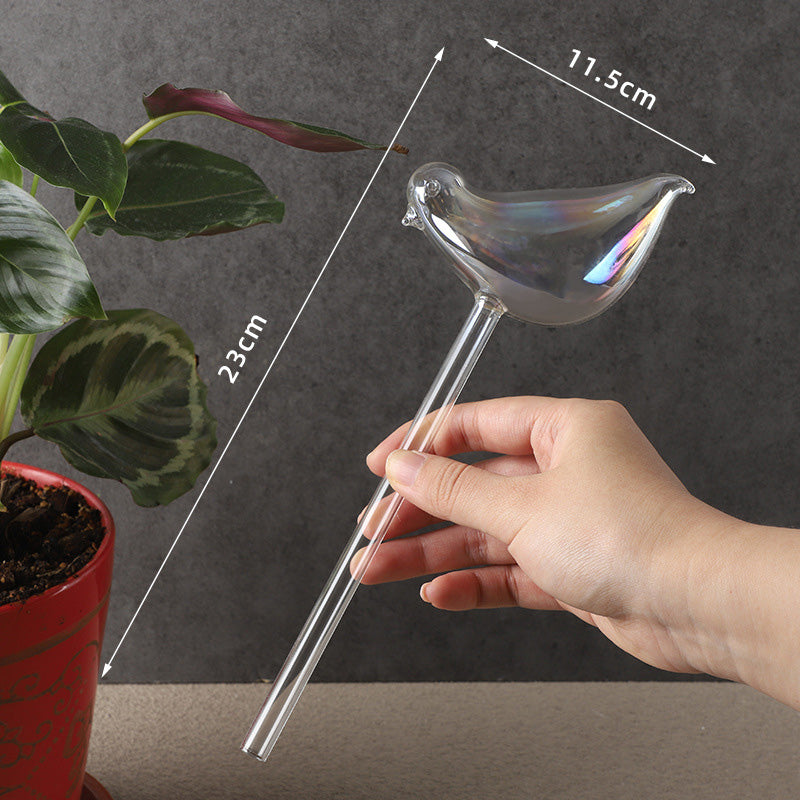 Fargerik soppvanningskanne/fargerikt automatisk vanningssystem laget av glass